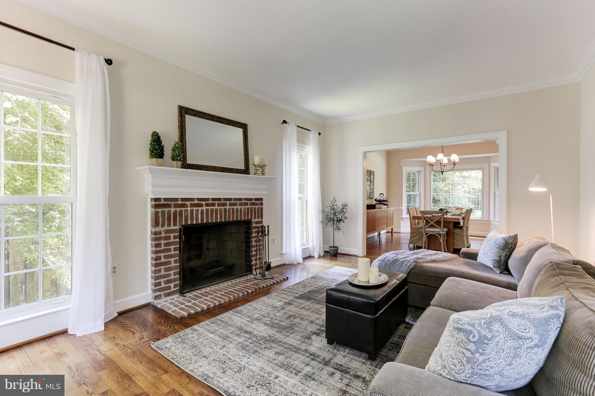 2861 Chain Bridge Road Vienna, VA 22181 - Photo 5 of 30 Living Room: Fireplace & Tall Windows