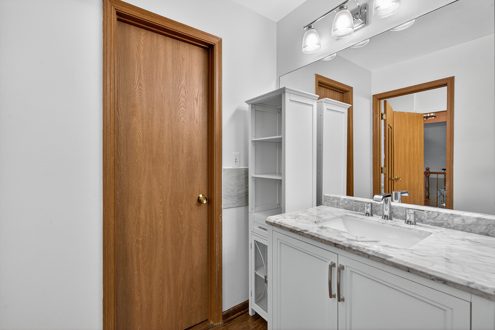 208 Bingham Circle Mundelein, IL 60060 - Photo 14 of 23 a bathroom with a granite countertop sink and a mirror
