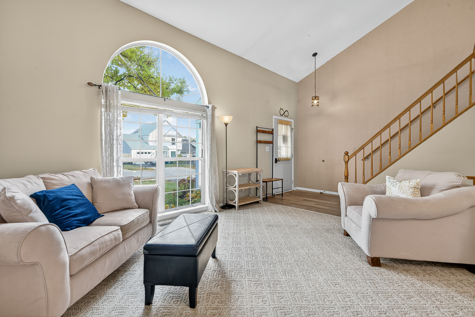 208 Bingham Circle Mundelein, IL 60060 - Photo 7 of 23 a living room with furniture and a large window