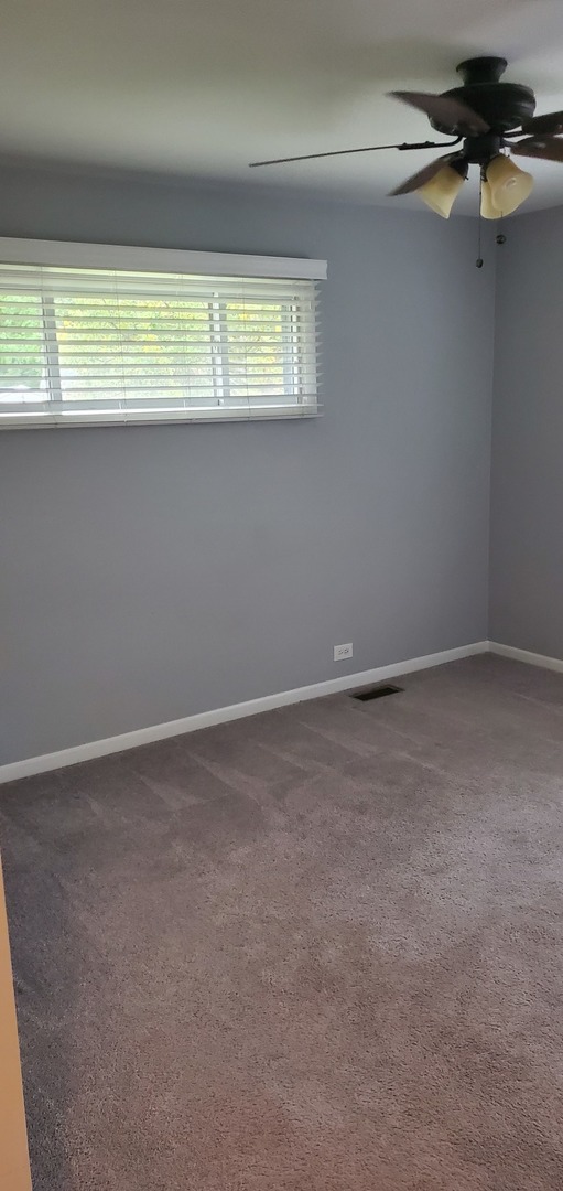 2212 Downey Road Homewood, IL 60430 - Photo 8 of 18 a view of an empty room with a window