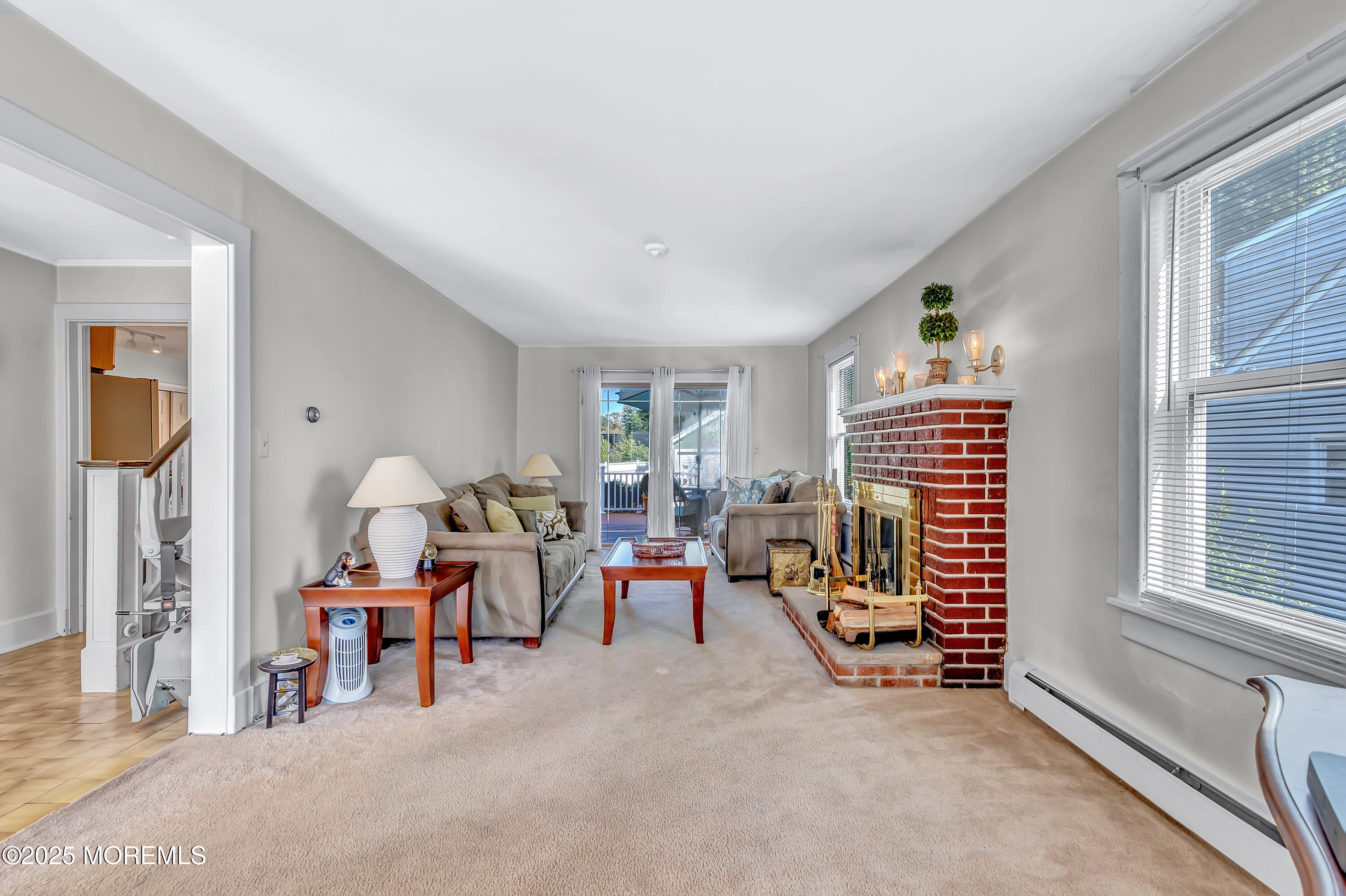 390 Conover Place Red Bank, NJ 07701 - Photo 11 of 39 a living room with furniture and a flat screen tv