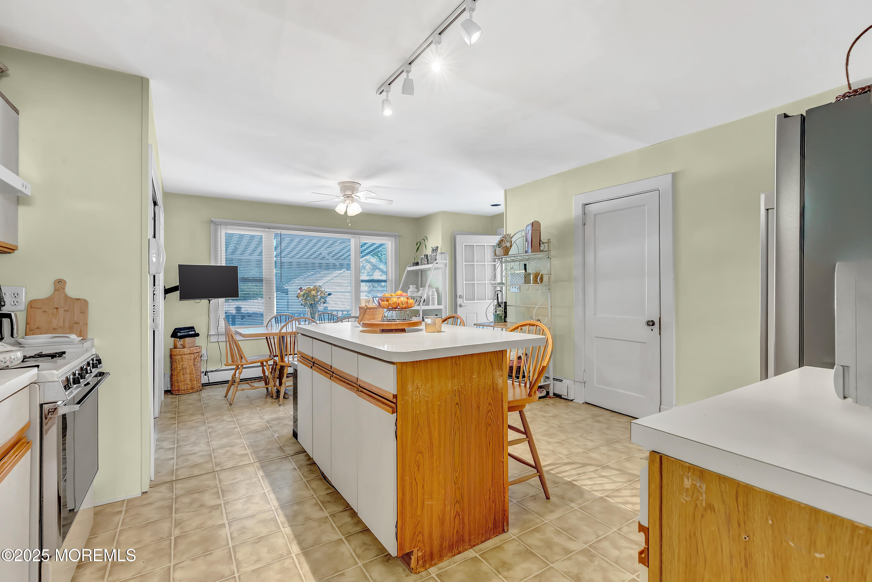 390 Conover Place Red Bank, NJ 07701 - Photo 17 of 39 a kitchen with sink stove and refrigerator
