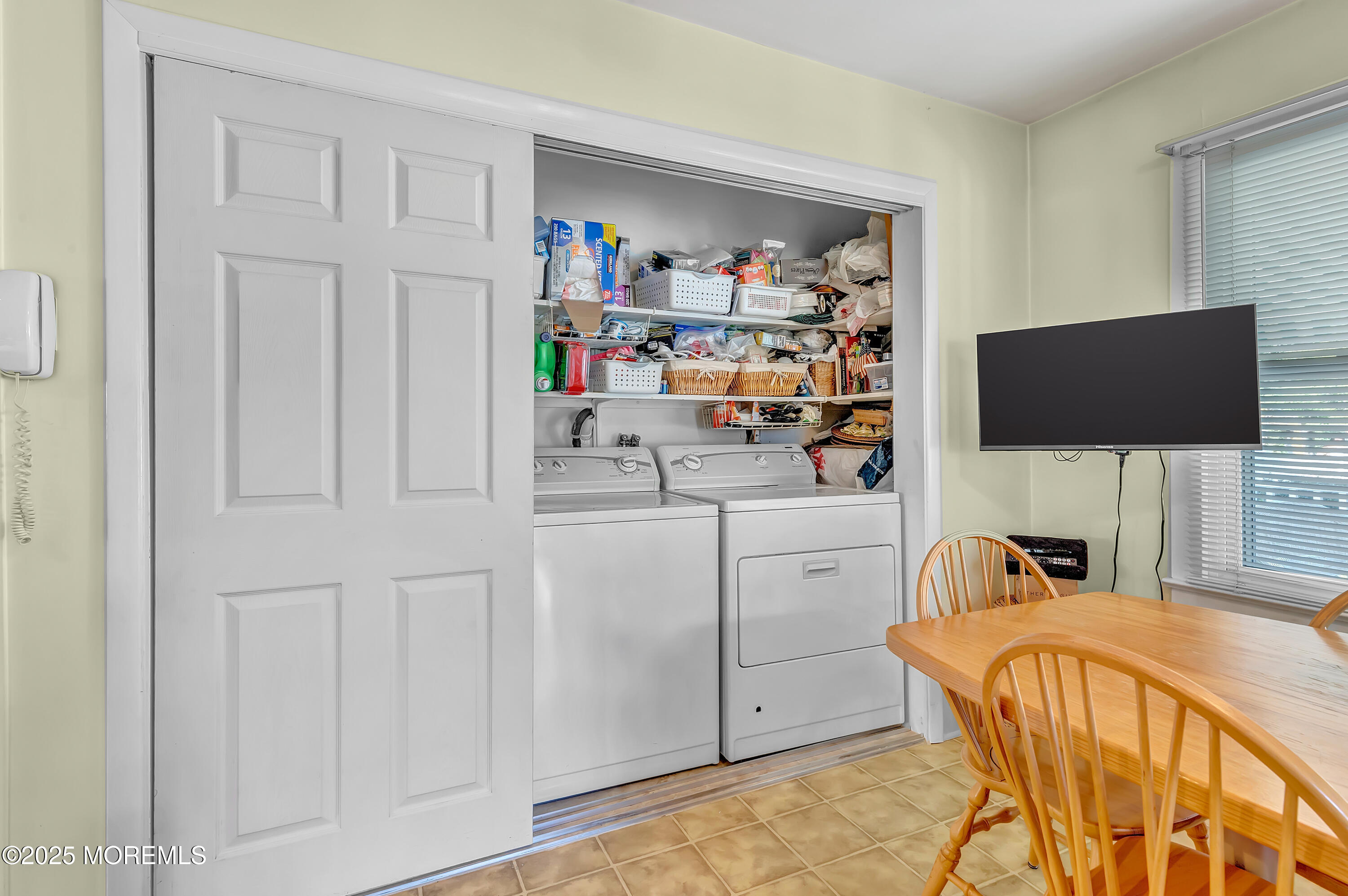 390 Conover Place Red Bank, NJ 07701 - Photo 19 of 39 a bedroom with a bed and a flat screen tv