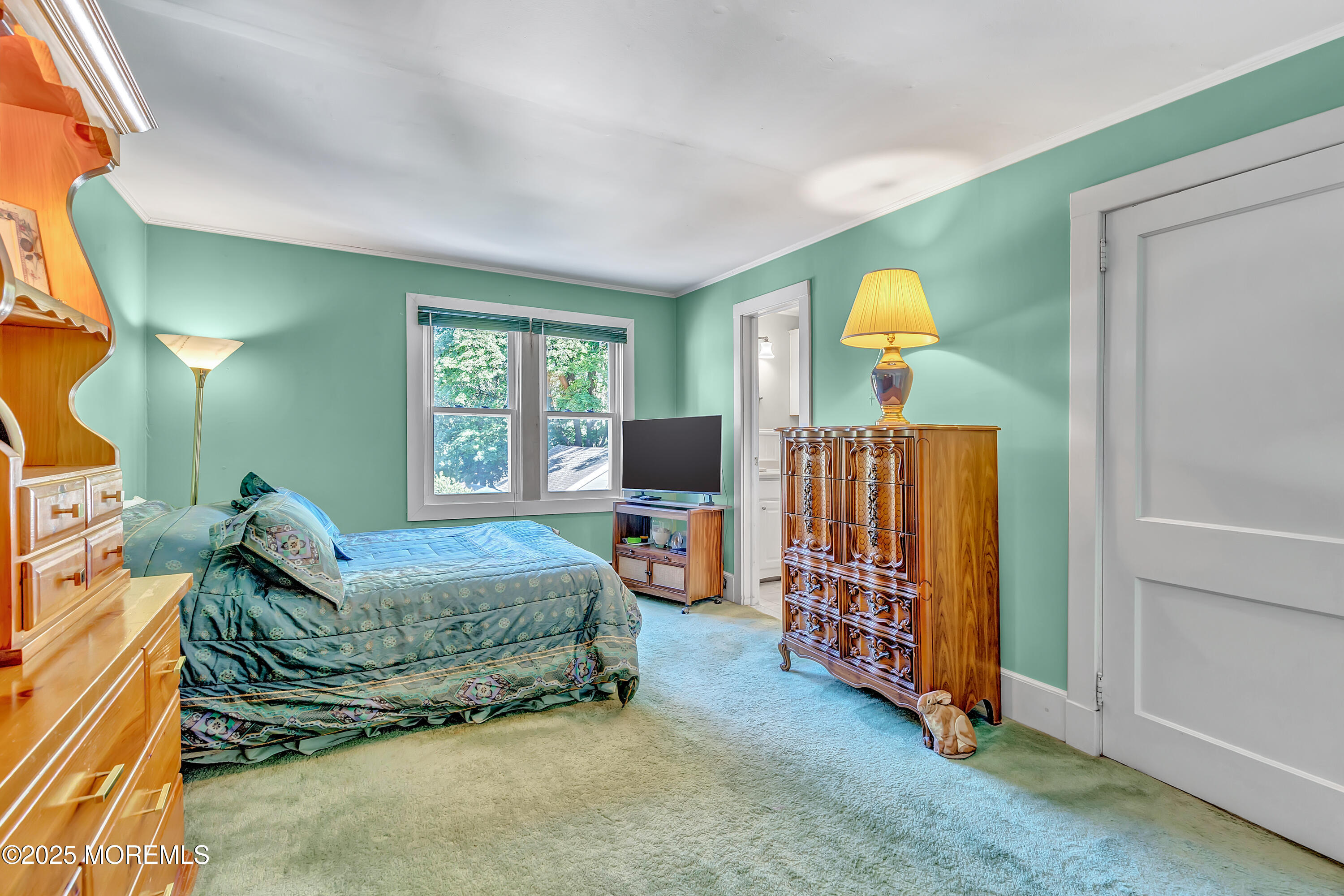 390 Conover Place Red Bank, NJ 07701 - Photo 23 of 39 a living room with furniture and a flat screen tv