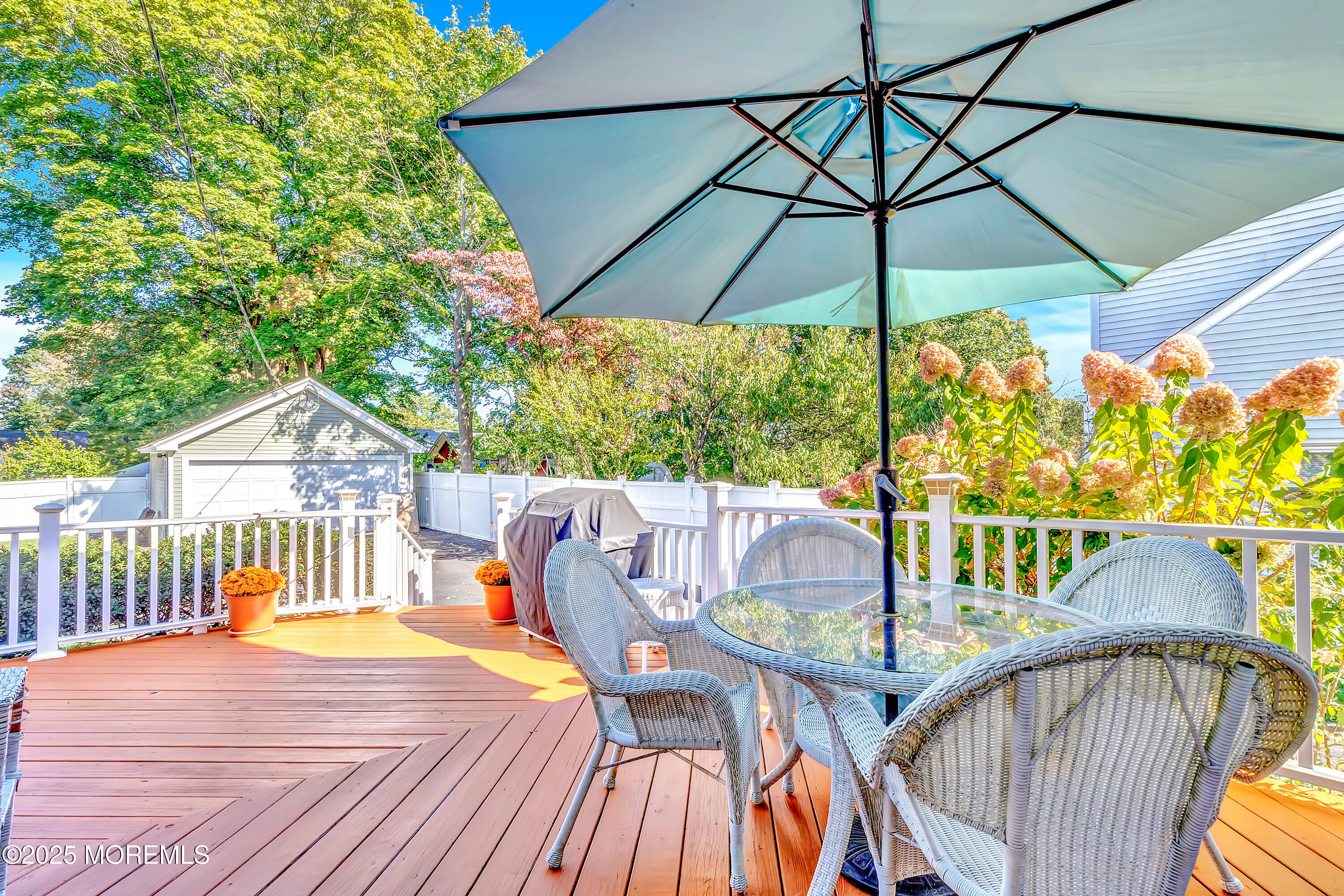 390 Conover Place Red Bank, NJ 07701 - Photo 29 of 39 a view of balcony with furniture and umbrella