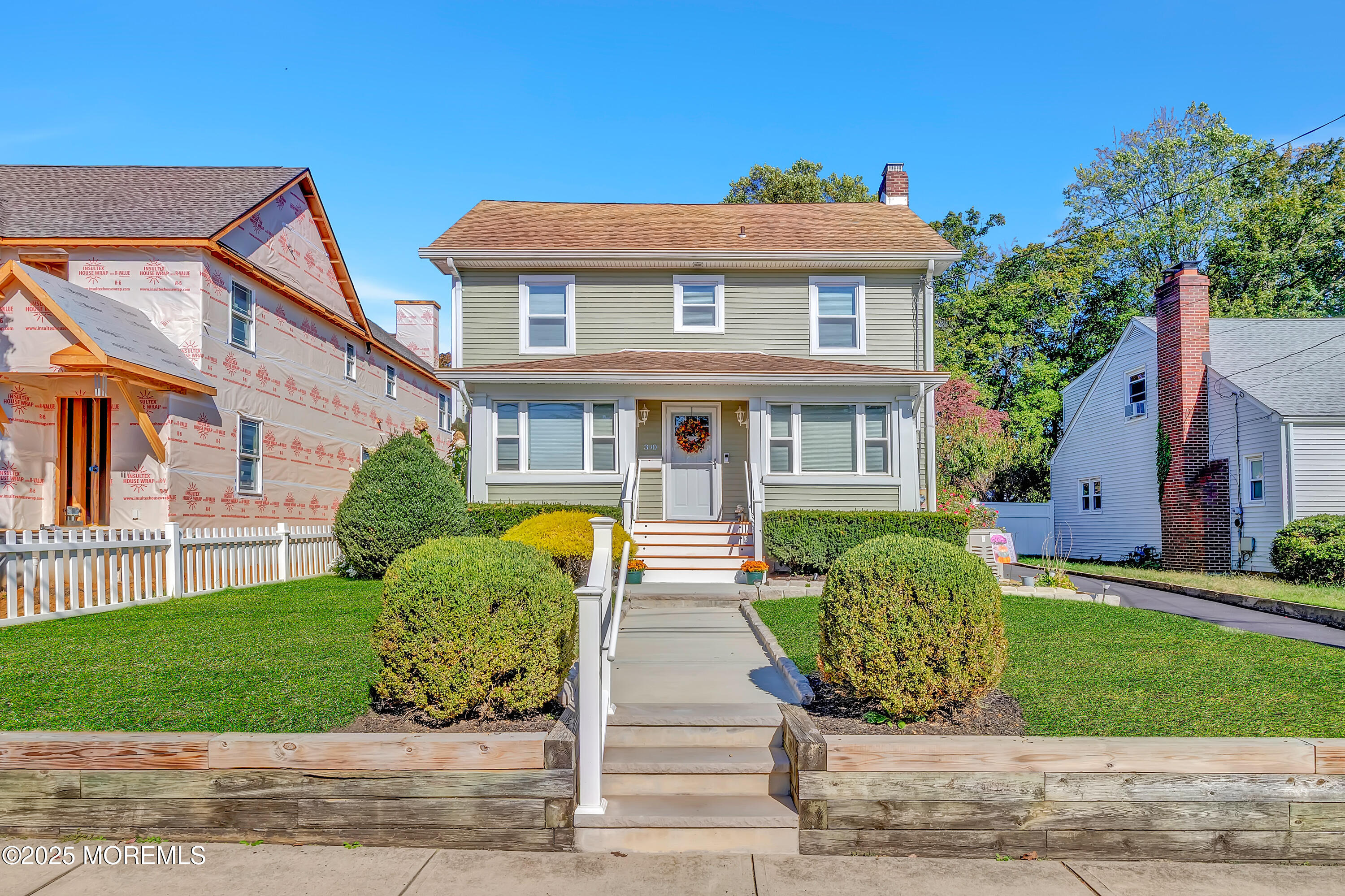 390 Conover Place Red Bank, NJ 07701 - Photo 3 of 39 a front view of a house with a yard