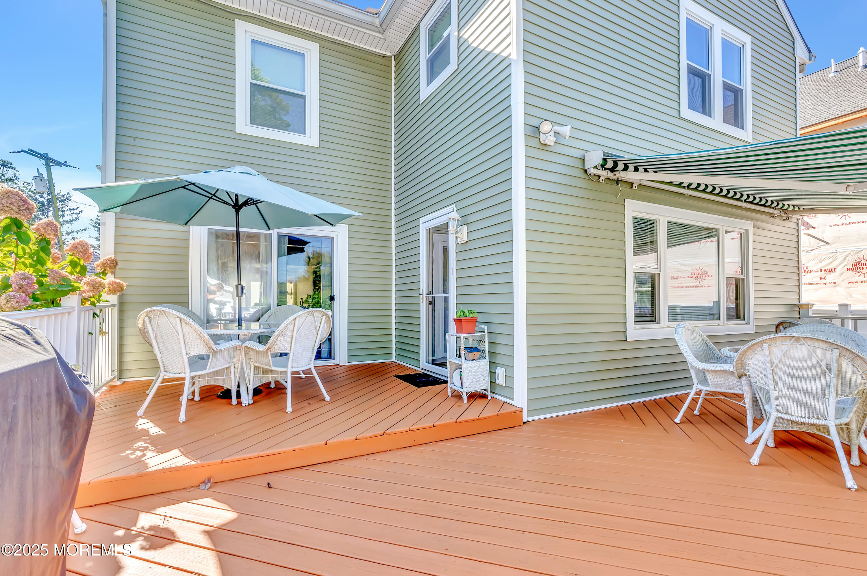 390 Conover Place Red Bank, NJ 07701 - Photo 31 of 39 a view of a house with backyard and sitting area