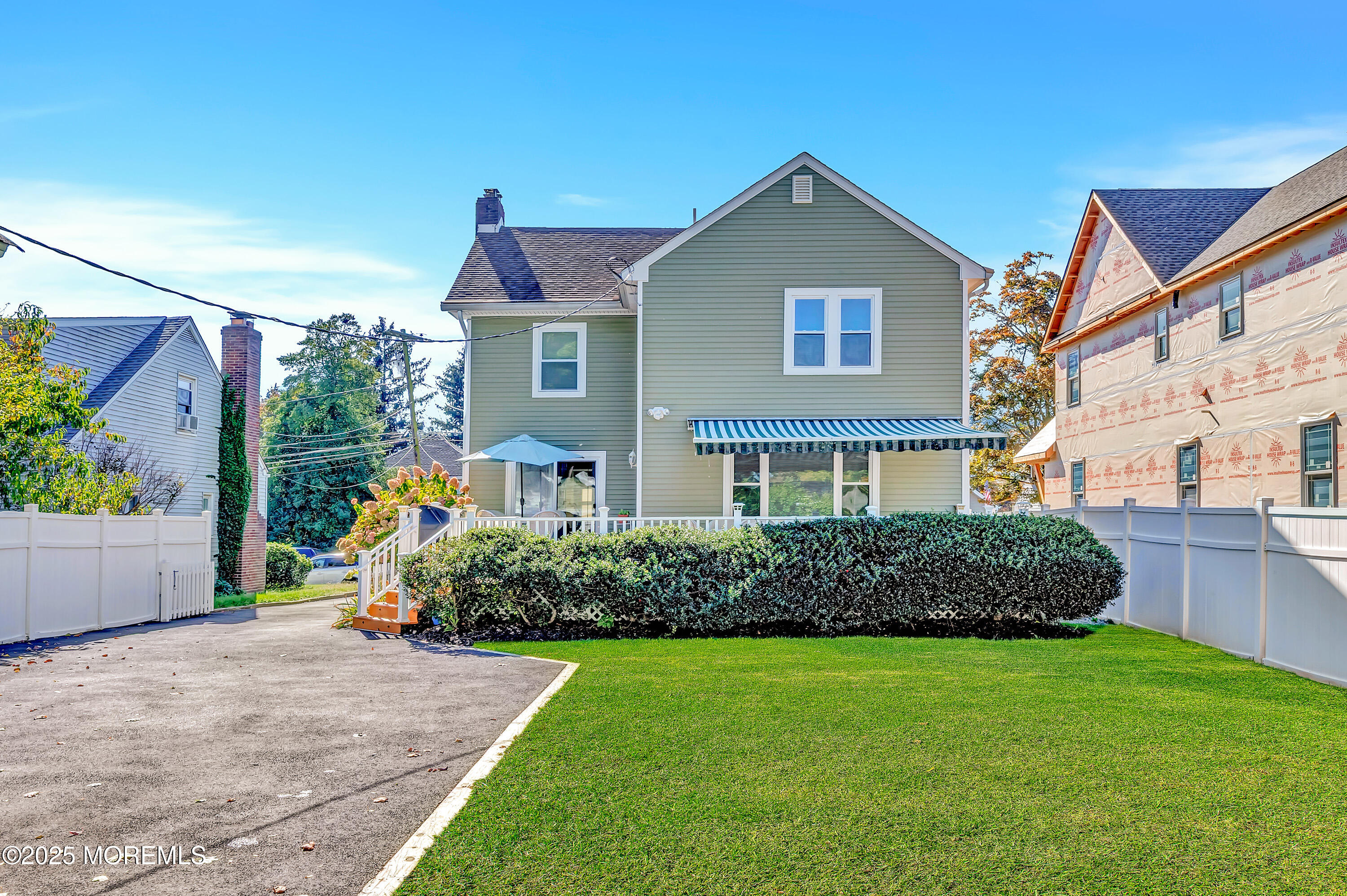 390 Conover Place Red Bank, NJ 07701 - Photo 34 of 39 a front view of a house with a yard