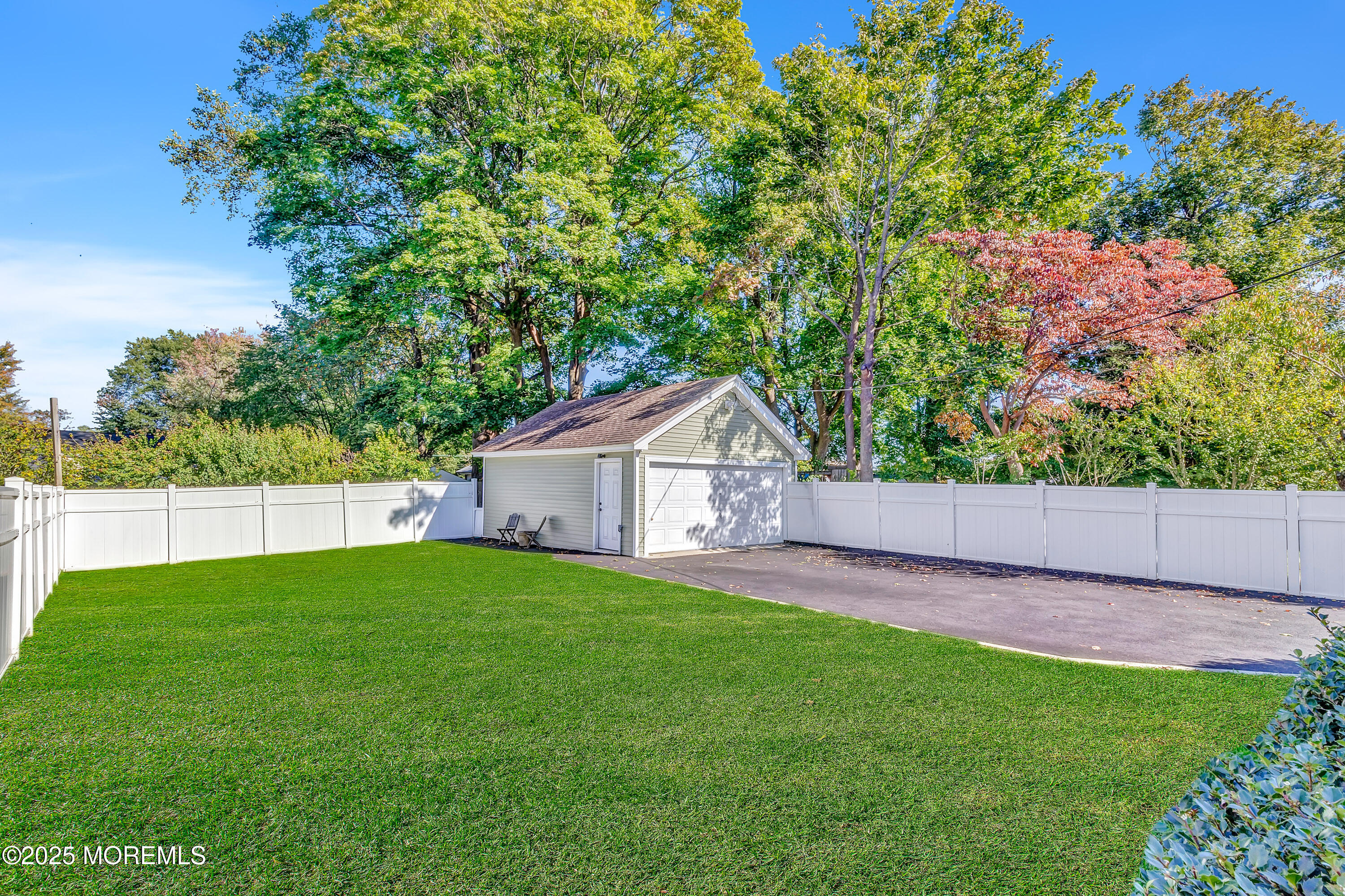 390 Conover Place Red Bank, NJ 07701 - Photo 35 of 39 a backyard of a house with lots of green space