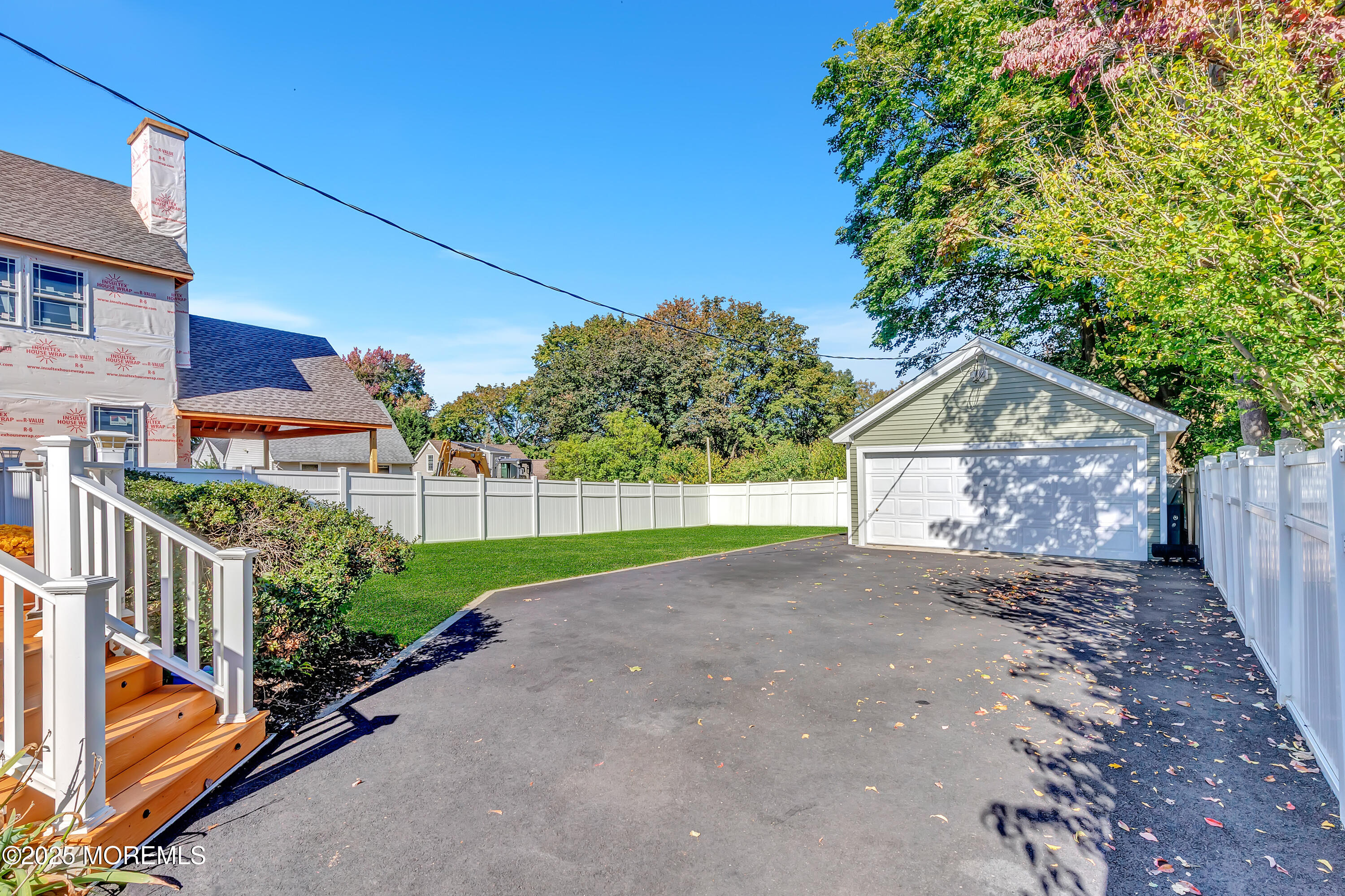390 Conover Place Red Bank, NJ 07701 - Photo 36 of 39 a view of a house with a yard and potted plants