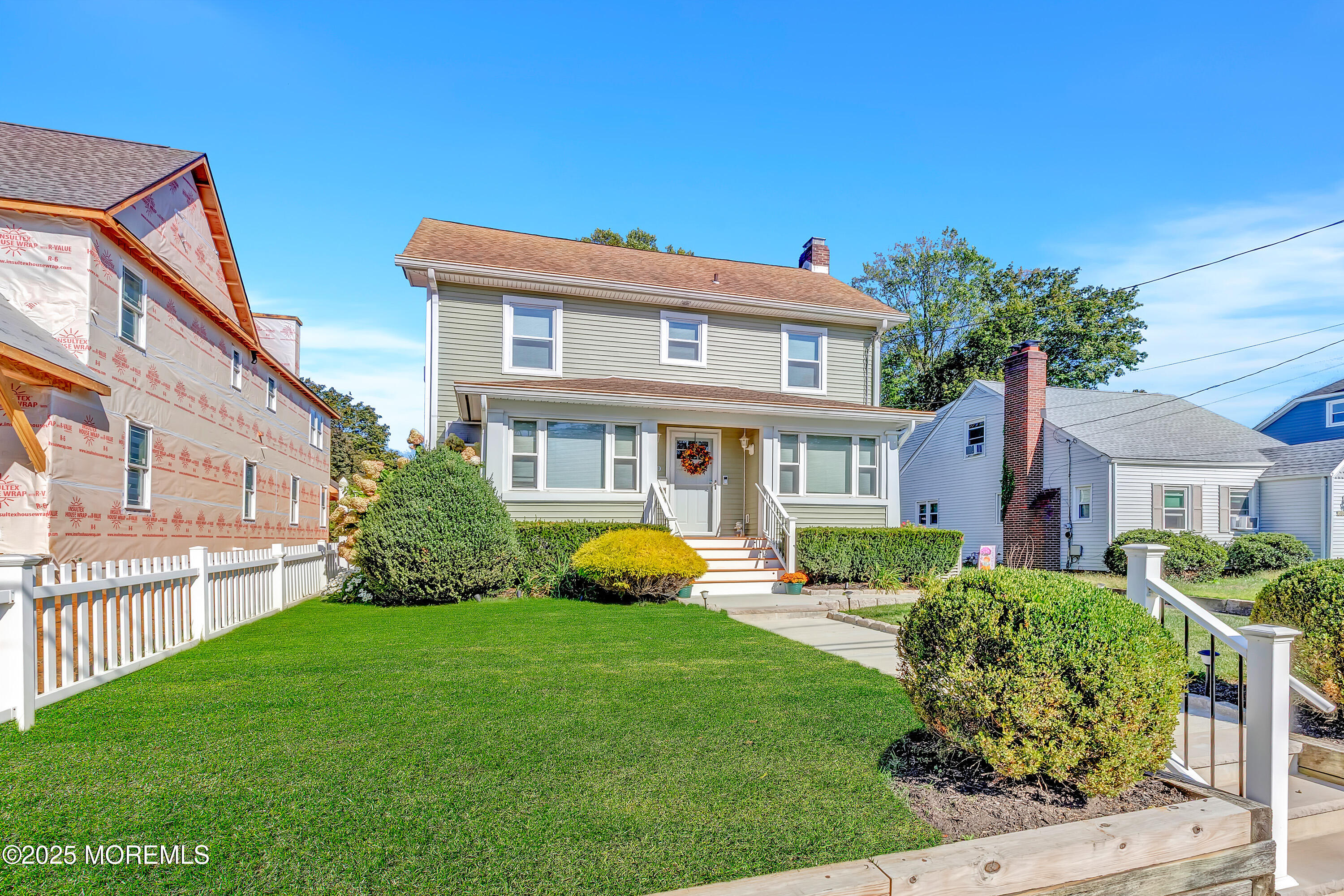 390 Conover Place Red Bank, NJ 07701 - Photo 4 of 39 a front view of house with yard and green space