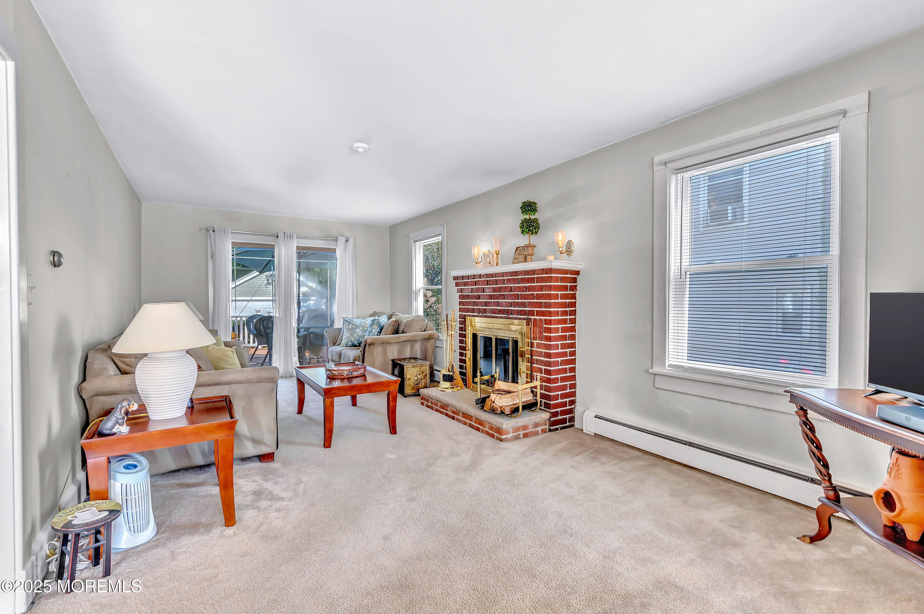 390 Conover Place Red Bank, NJ 07701 - Photo 10 of 39 a living room with furniture and a fireplace