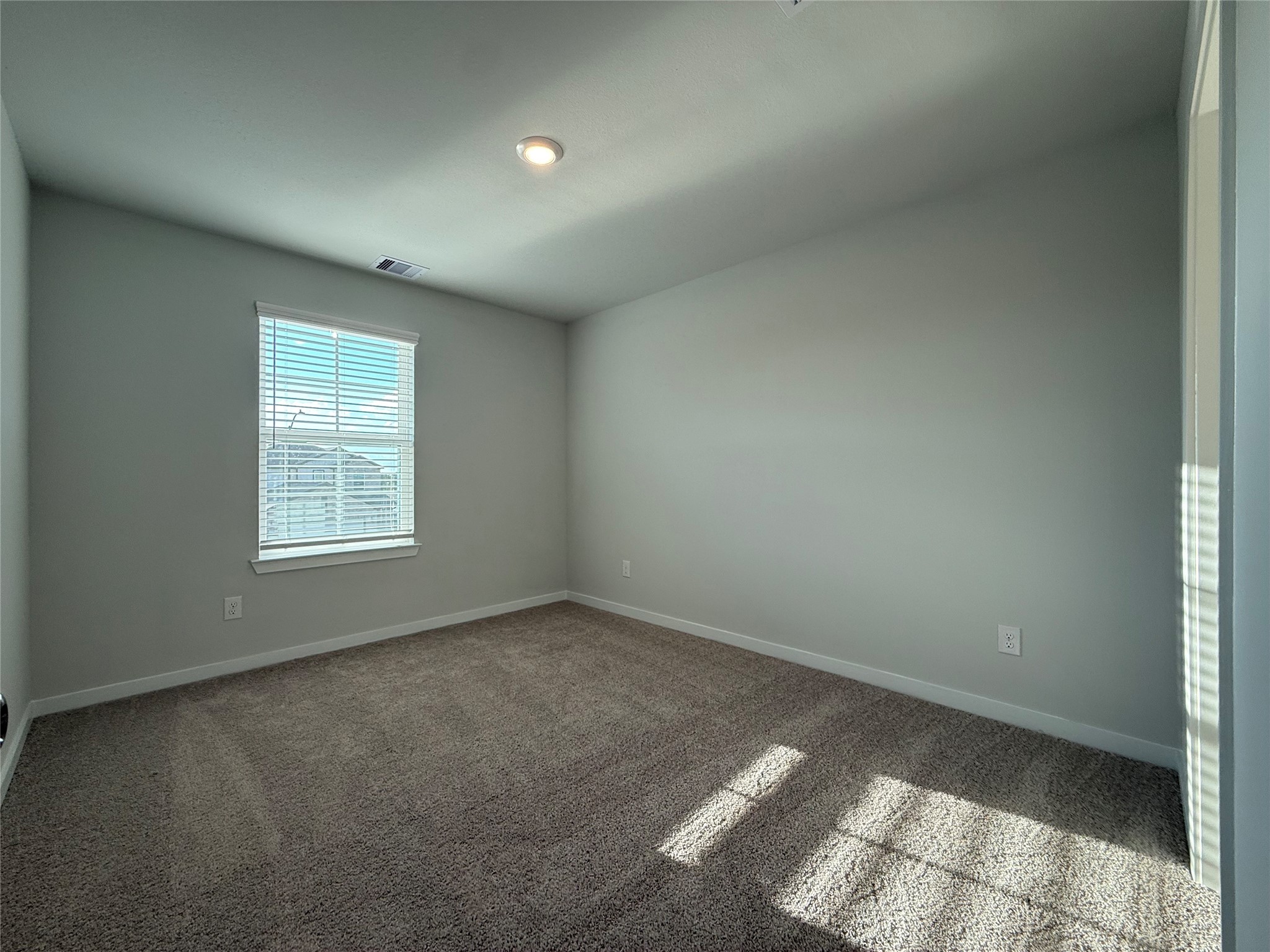 3914 Flora Fld Drive Brookshire, TX 77423 - Photo 24 of 32 an empty room with a window