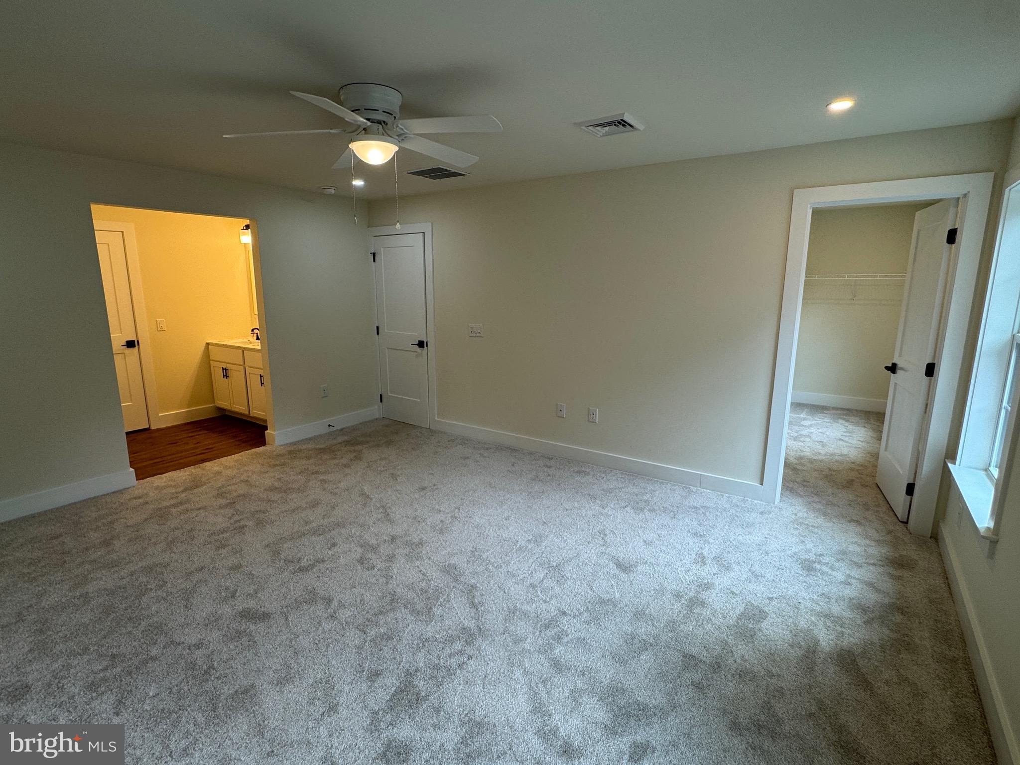 14 Wynn Road Tabernacle, NJ 08088 - Photo 20 of 33 an empty room with a window and a ceiling fan