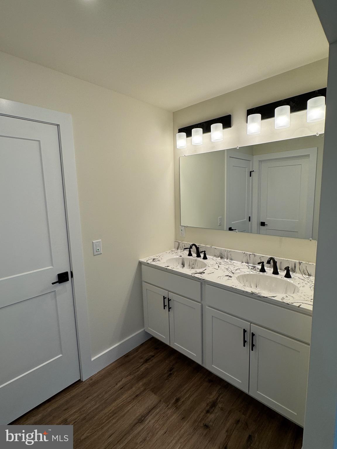 14 Wynn Road Tabernacle, NJ 08088 - Photo 21 of 33 a bathroom with a double vanity sink and mirror