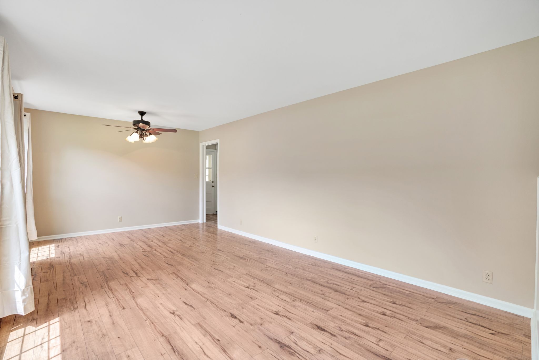 2105 Post Road Clarksville, TN 37043 - Photo 9 of 22 wooden floor in an empty room