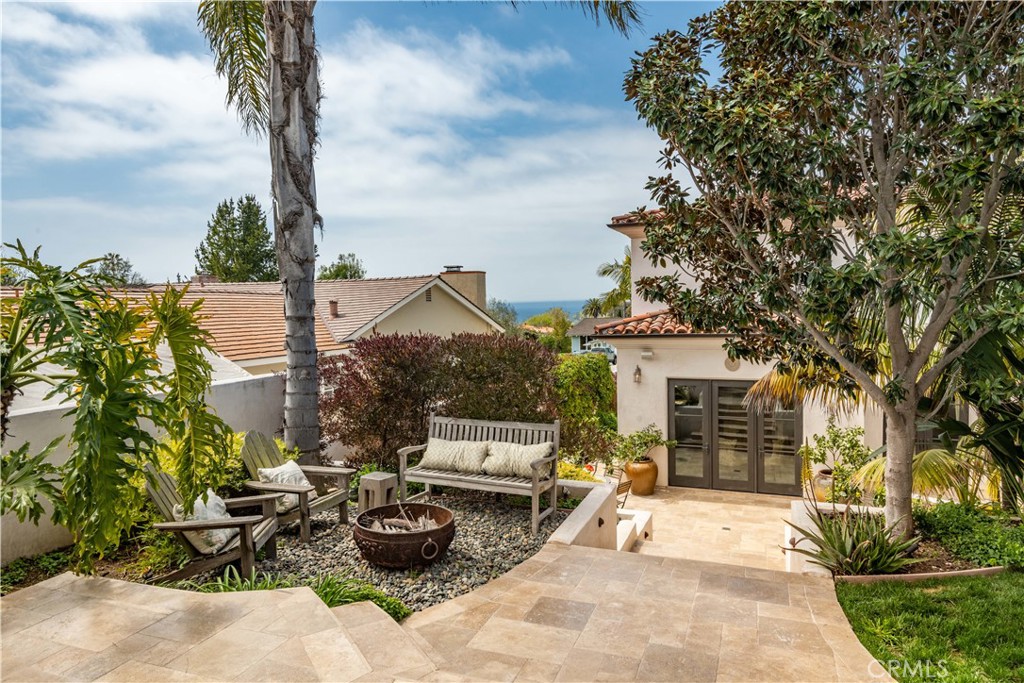 1716 Addison Road Palos Verdes Estates, CA 90274 - Photo 18 of 55 a view of a patio with couches and potted plants