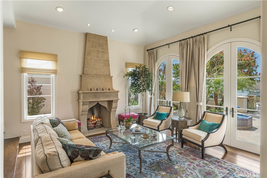 1716 Addison Road Palos Verdes Estates, CA 90274 - Photo 7 of 55 a living room with furniture fireplace and large windows