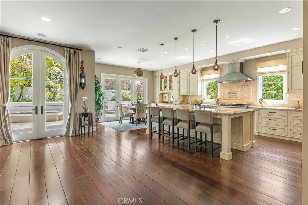 1716 Addison Road Palos Verdes Estates, CA 90274 - Photo 10 of 55 a large kitchen with lots of counter space a sink appliances and a large window