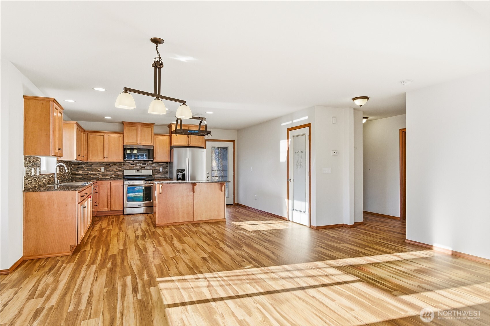 3043 Scotland Alley Mount Vernon, WA 98273 - Photo 9 of 32 a view of kitchen with wooden floor