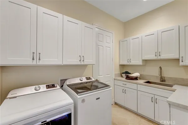 a view of swimming pool with outdoor seating