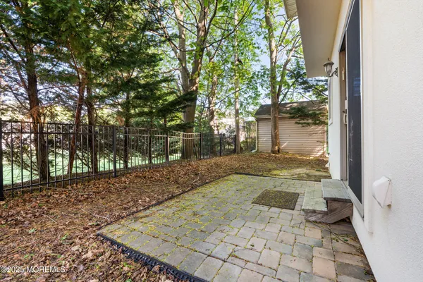 a view of a backyard of the house