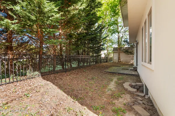 a view of backyard with green space