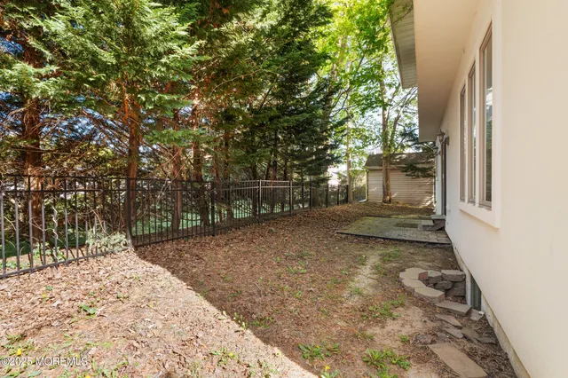 a view of backyard with green space