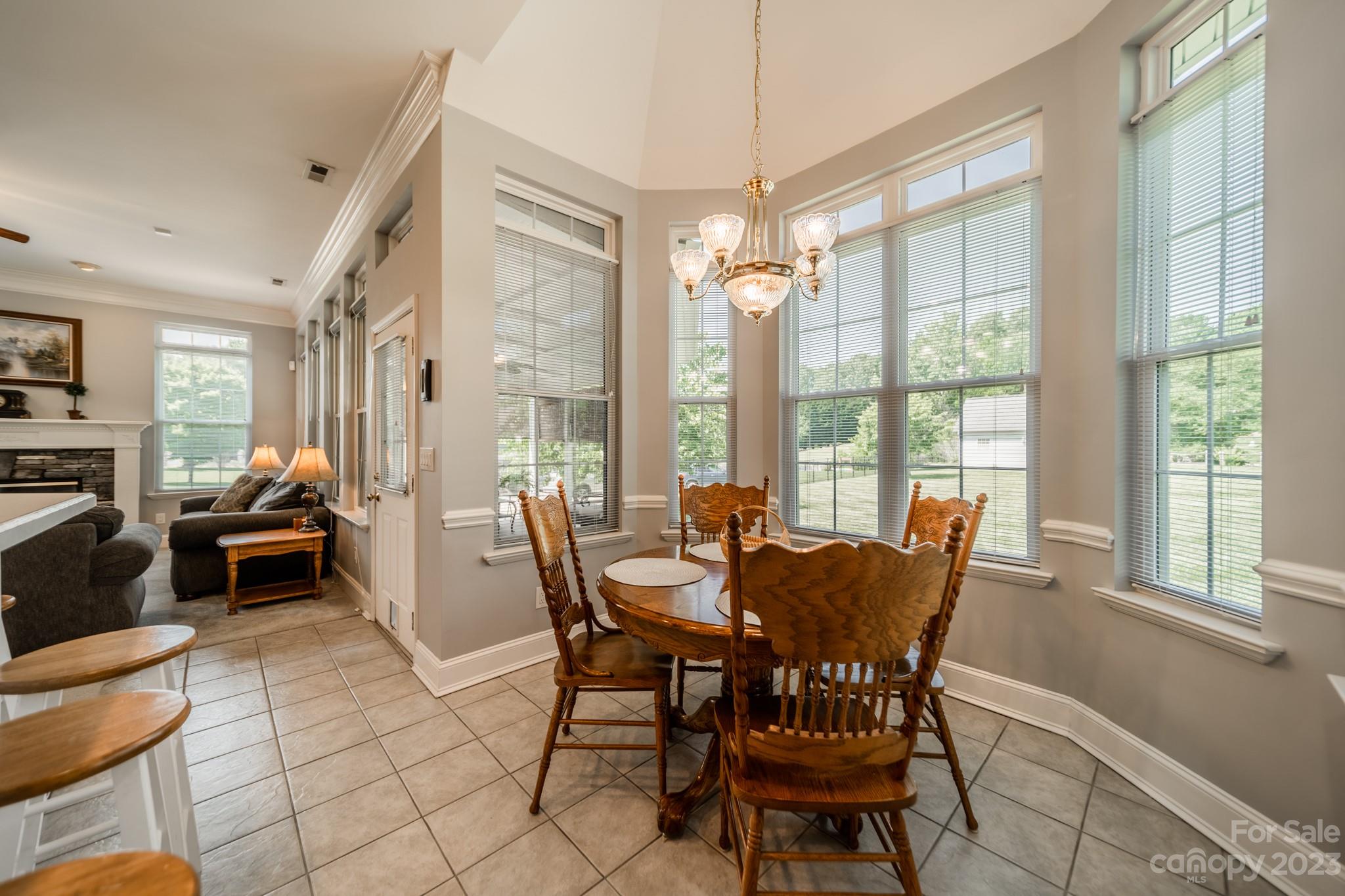 175 Perrin Road Mooresville, NC 28117 - Photo 11 of 45 a view of a dining room with furniture window and outside view