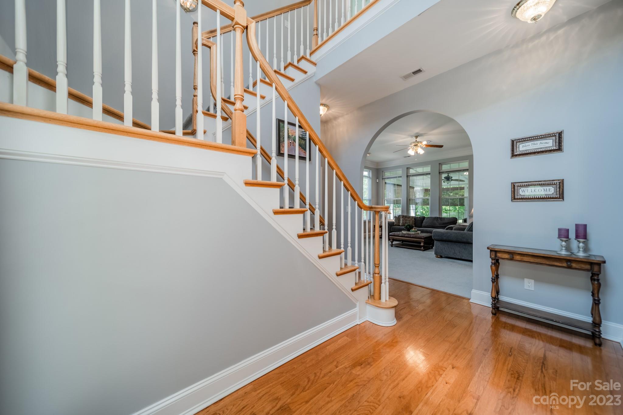 175 Perrin Road Mooresville, NC 28117 - Photo 21 of 45 a view of livingroom with furniture and stairs