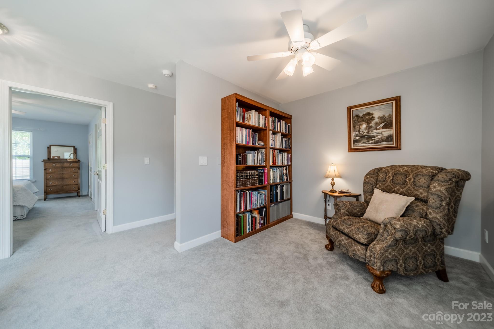 175 Perrin Road Mooresville, NC 28117 - Photo 22 of 45 a living room with furniture and ceiling fan