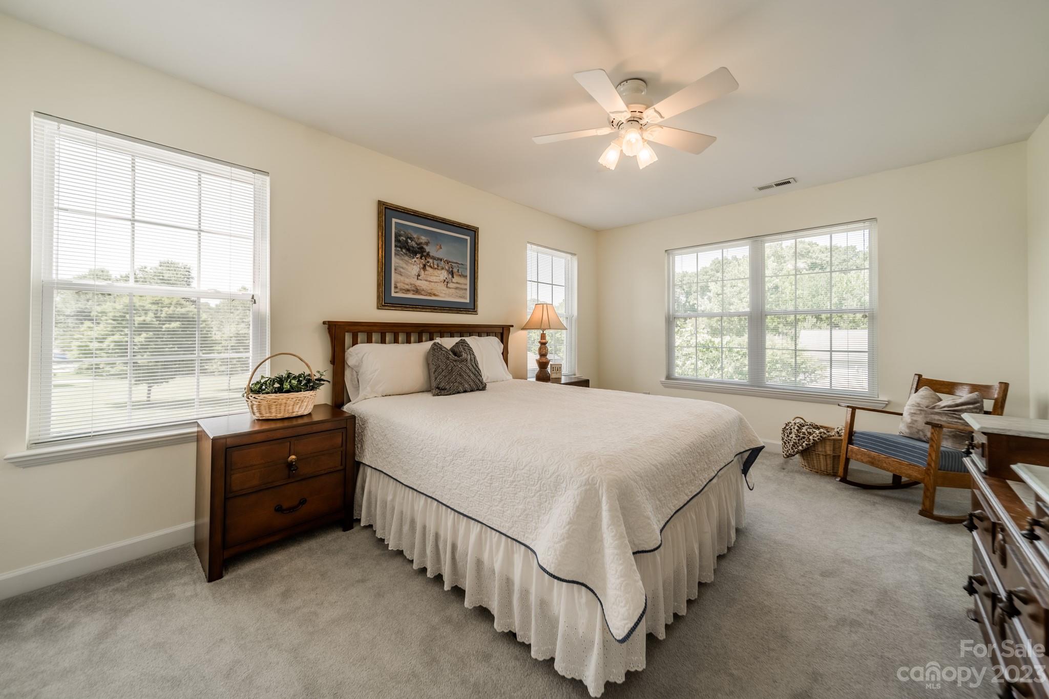 175 Perrin Road Mooresville, NC 28117 - Photo 23 of 45 a bedroom with a bed and a window