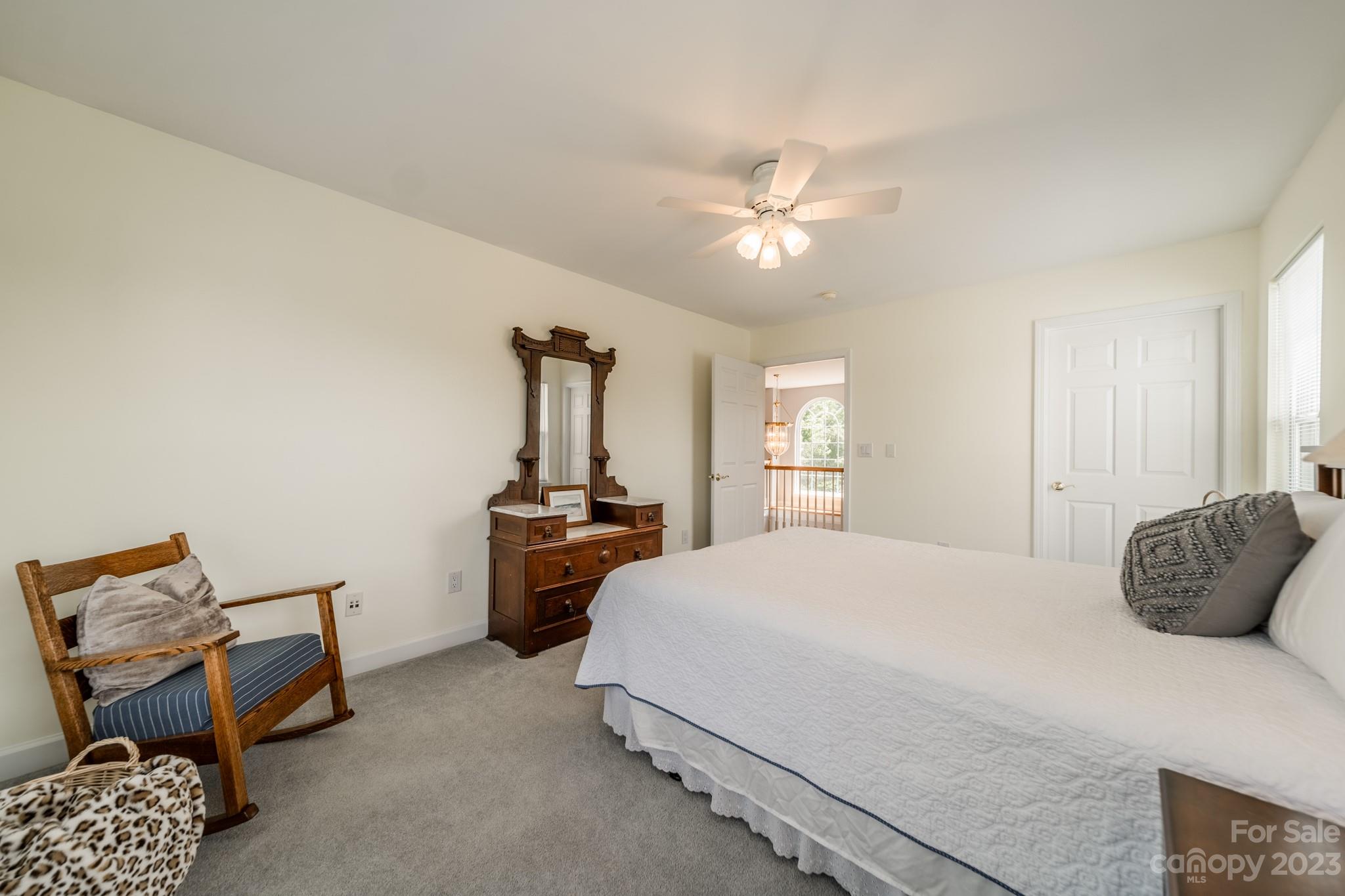 175 Perrin Road Mooresville, NC 28117 - Photo 24 of 45 a bedroom with a bed and dresser