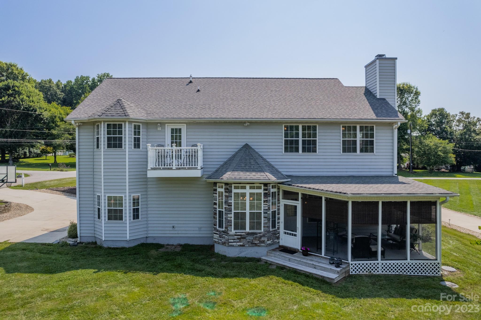 175 Perrin Road Mooresville, NC 28117 - Photo 36 of 45 a view of a house with a garden and yard