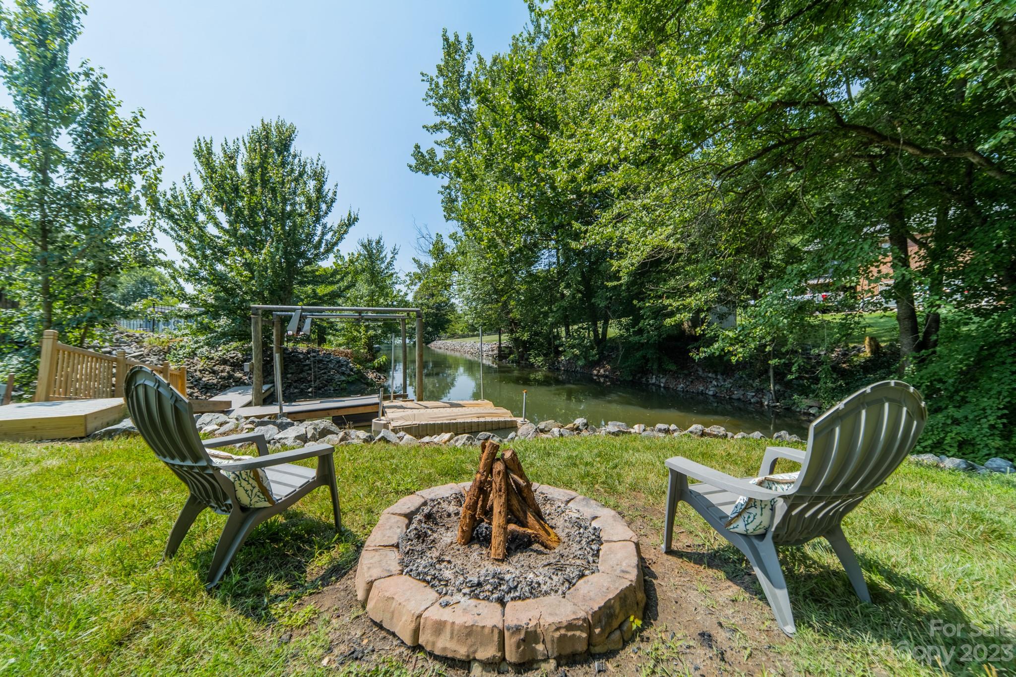 175 Perrin Road Mooresville, NC 28117 - Photo 40 of 45 a view of a swimming pool with a lounge chair