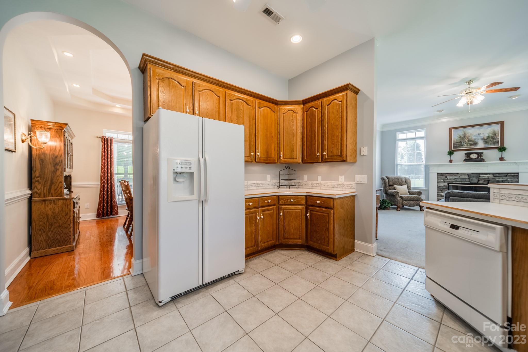 175 Perrin Road Mooresville, NC 28117 - Photo 9 of 45 a kitchen with stainless steel appliances granite countertop a refrigerator and a stove top oven