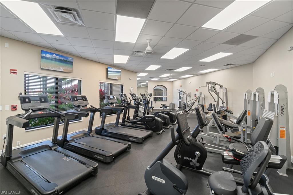 19753 Tesoro Way Estero, FL 33967 - Photo 43 of 47 a view of a room with gym equipment