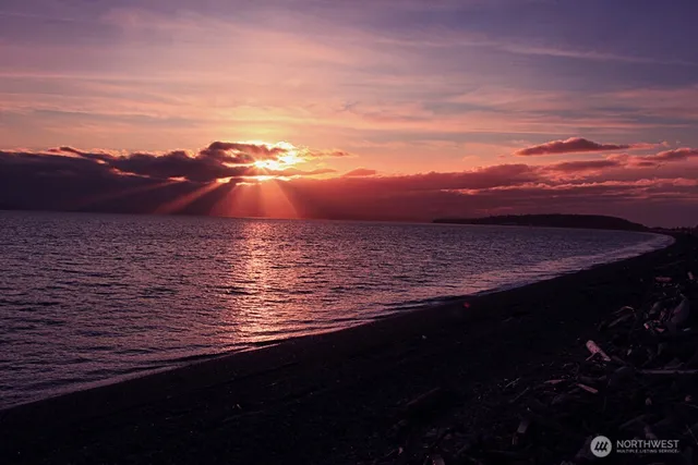 a view of a balcony with an ocean view