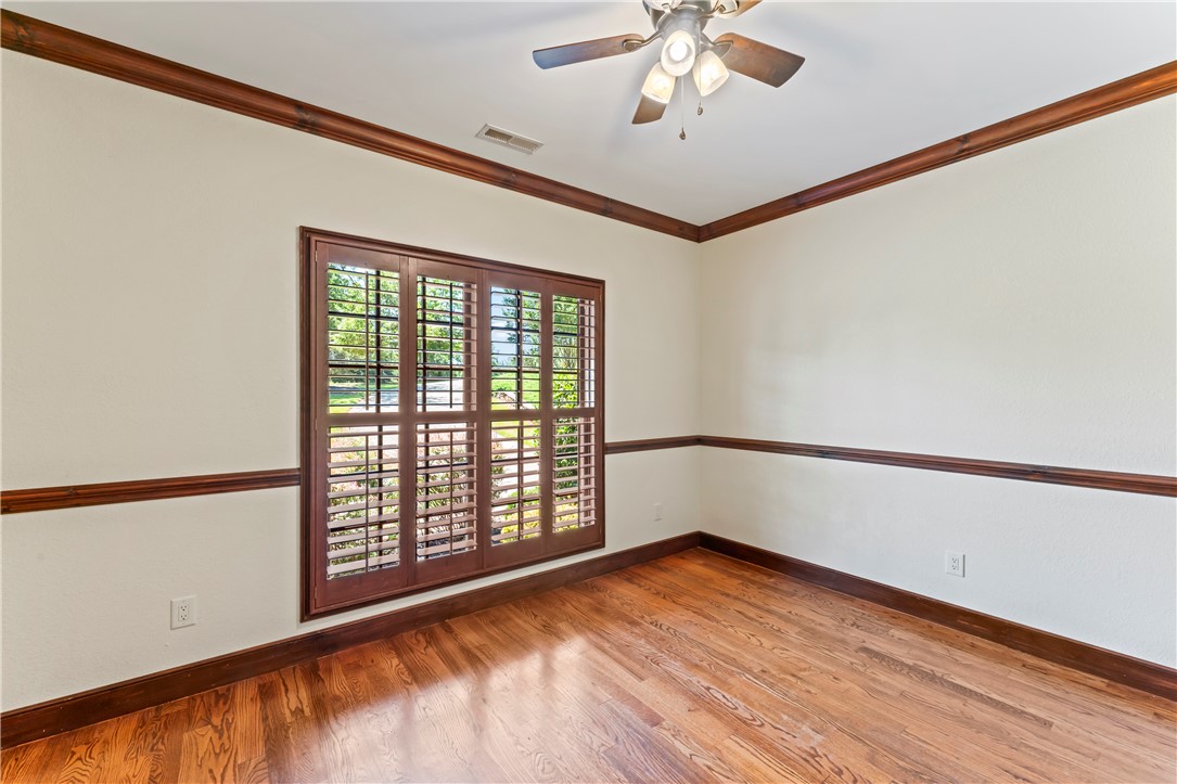 579 Terrapin Crossing Road Pickens, SC 29671 - Photo 24 of 50 Rich hardwood floors, wood plantation shutters, and classic crown molding frame a luminous space.