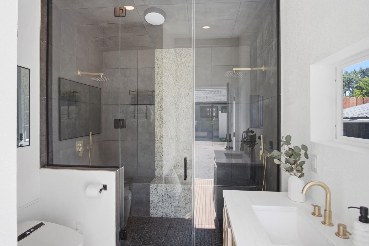 10401 Golf Link Road Turlock, CA 95380 - Photo 50 of 63 a bathroom with double vanity and a shower