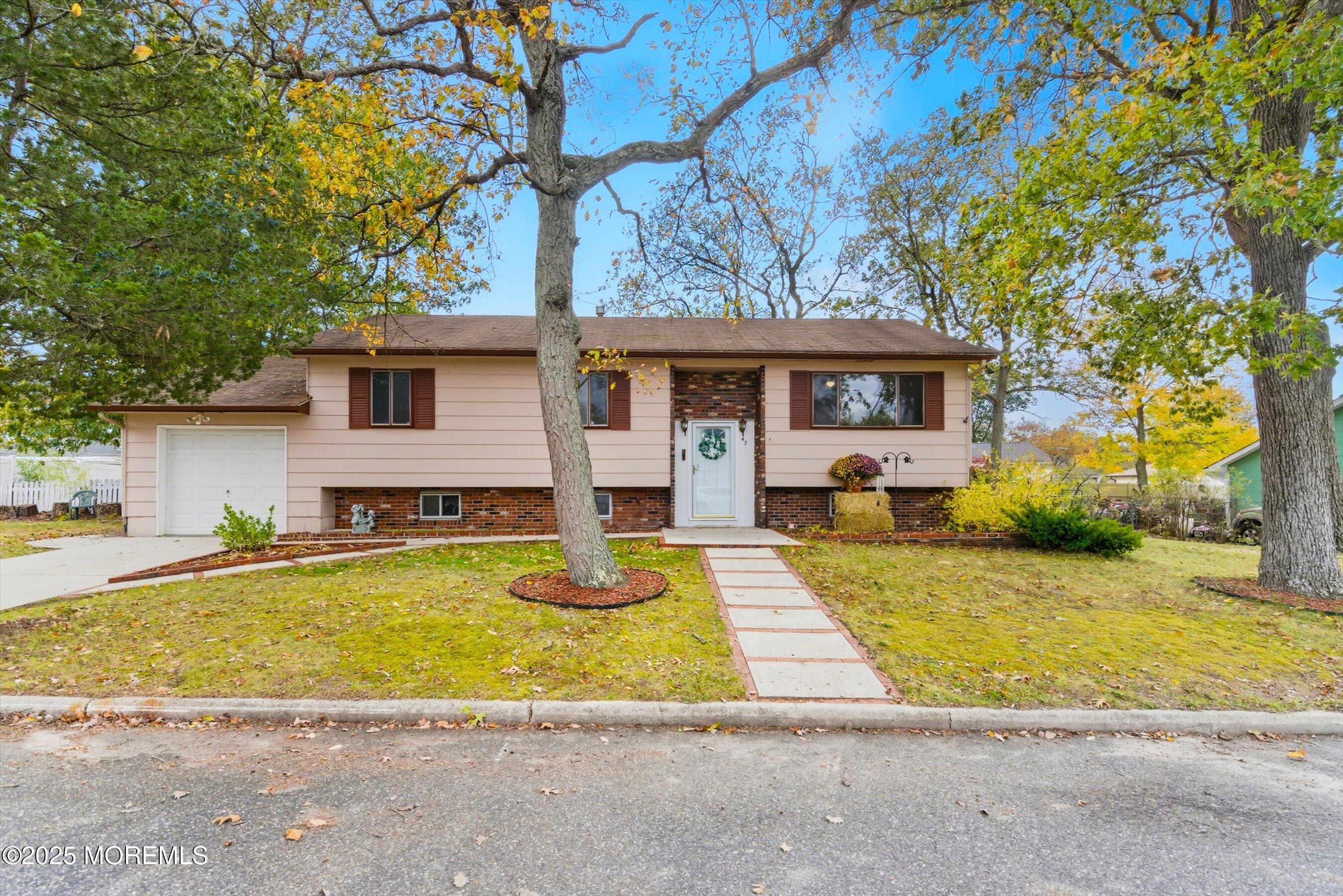 42 Monroe Avenue Browns Mills, NJ 08015 - Photo 1 of 29 a view of a house with a patio