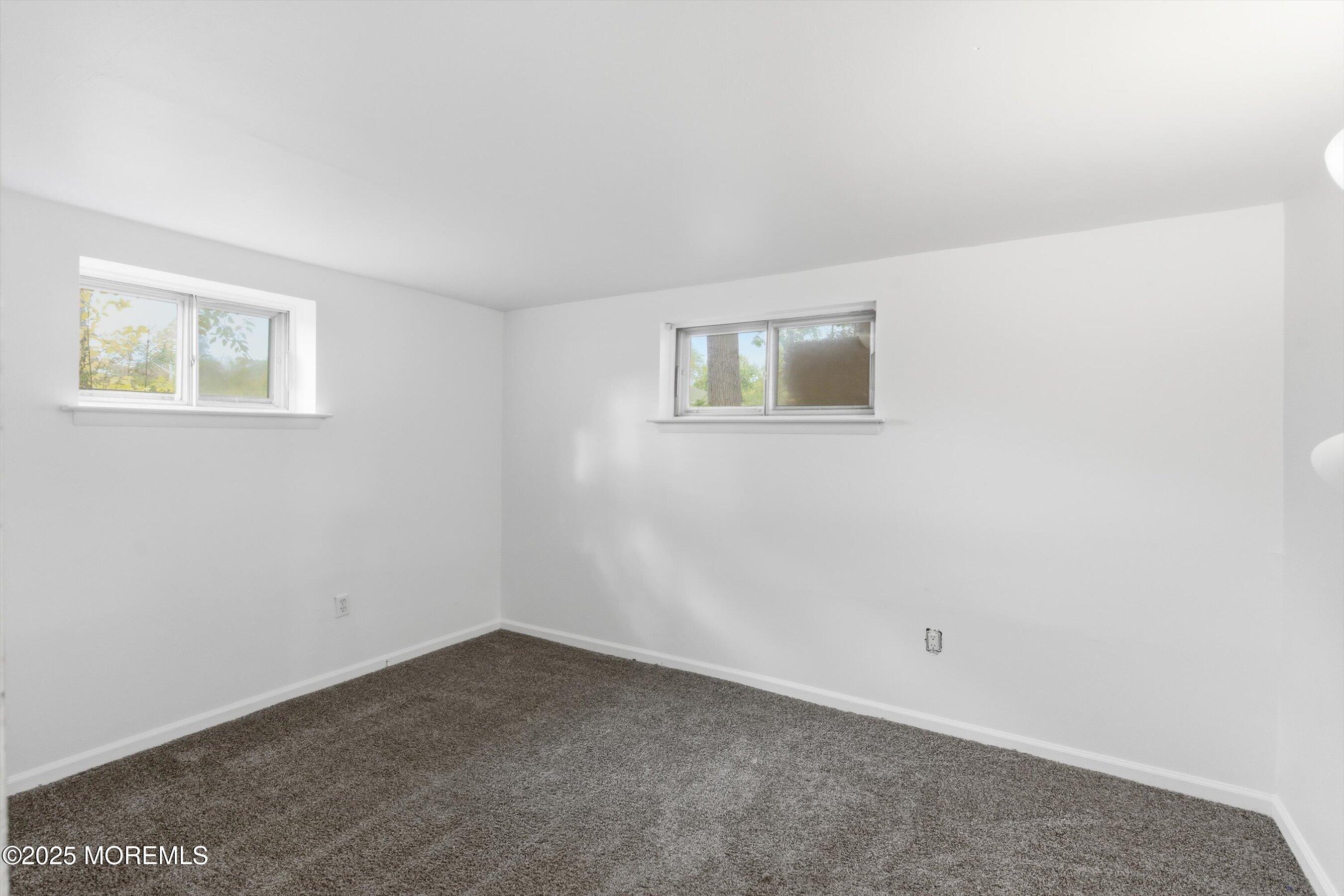 42 Monroe Avenue Browns Mills, NJ 08015 - Photo 16 of 29 a view of an empty room with a window