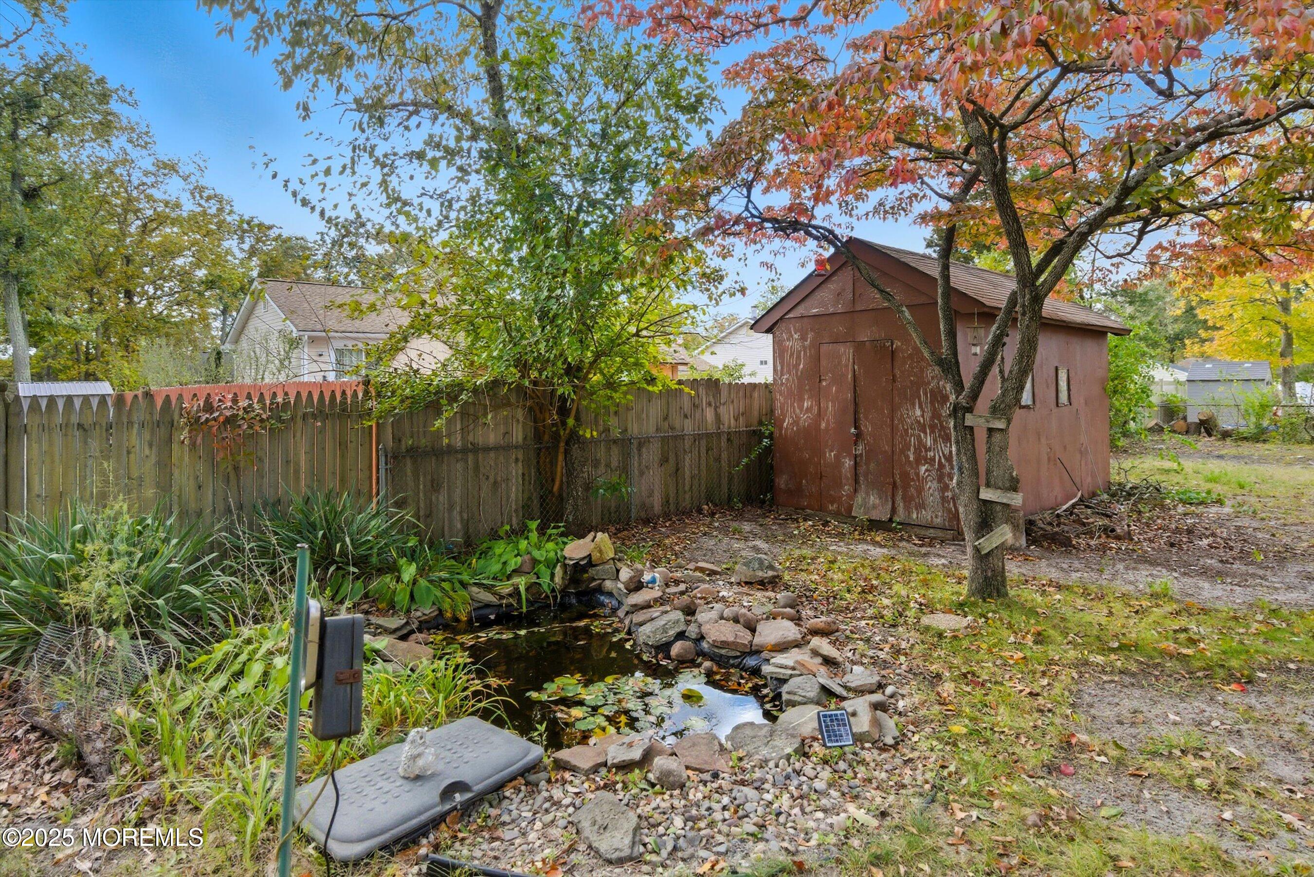 42 Monroe Avenue Browns Mills, NJ 08015 - Photo 25 of 29 a backyard of a house with lots of green space
