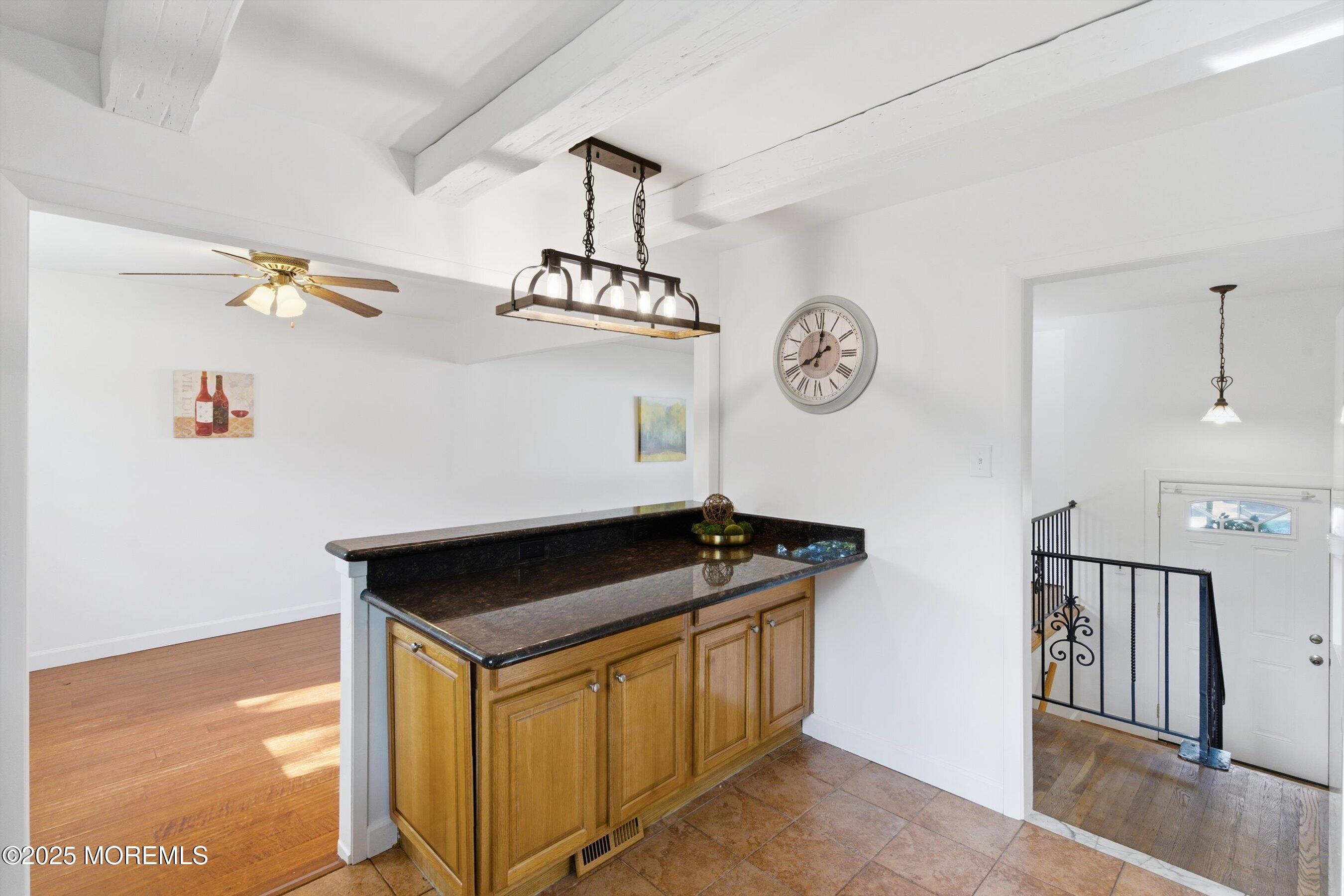 42 Monroe Avenue Browns Mills, NJ 08015 - Photo 8 of 29 a view of storage and utility room with racks on the wall