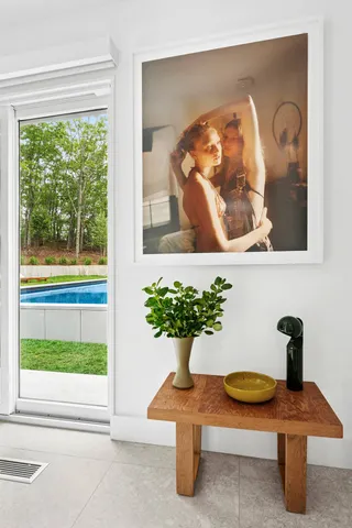 a view of a room with furniture and a potted plant