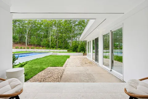a view of a porch with a backyard