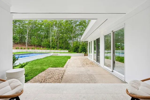 a view of a porch with a backyard