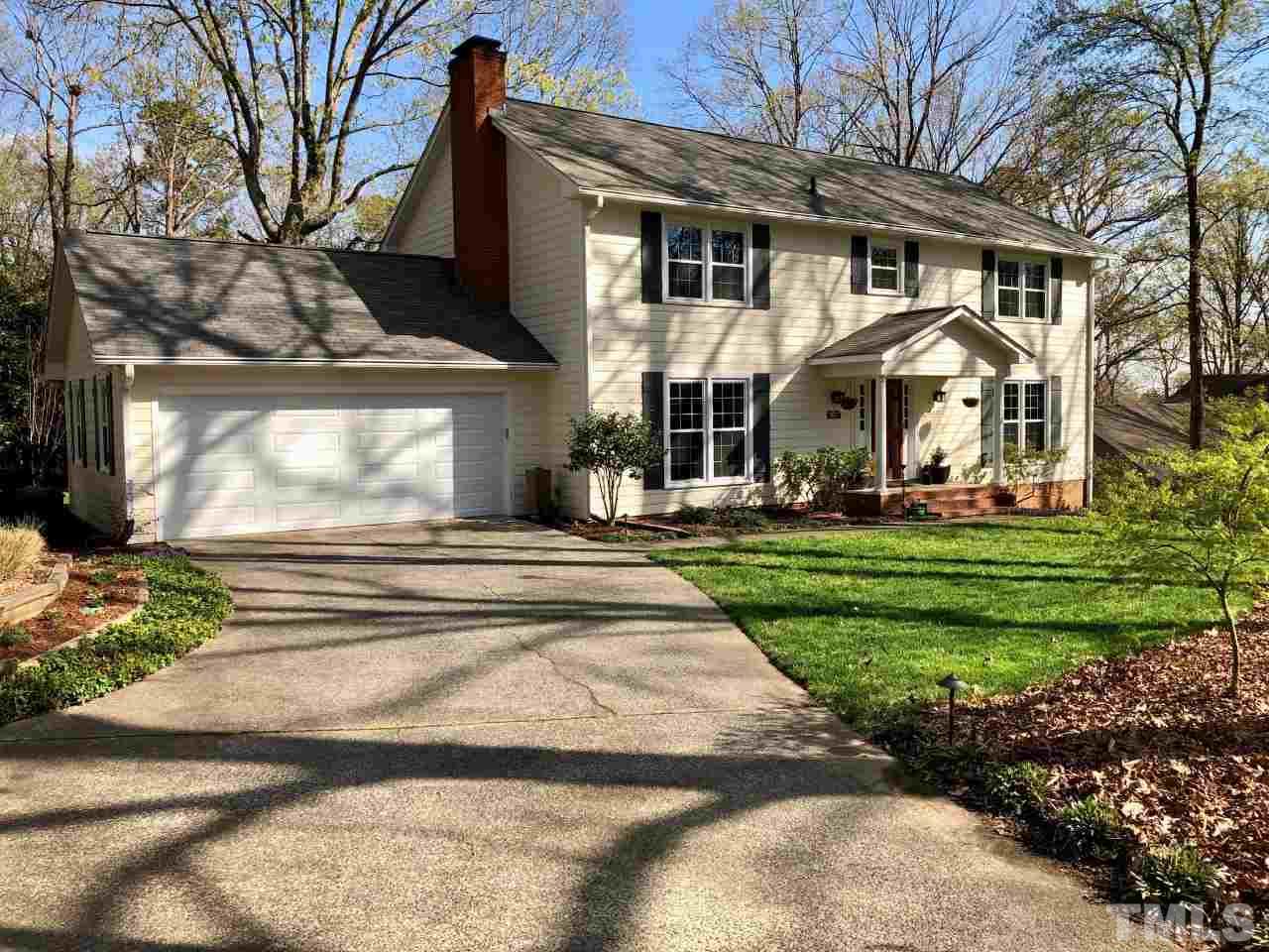 5412 Fairoaks Road Durham, NC 27712 - Photo 1 of 25 a front view of a house with a yard