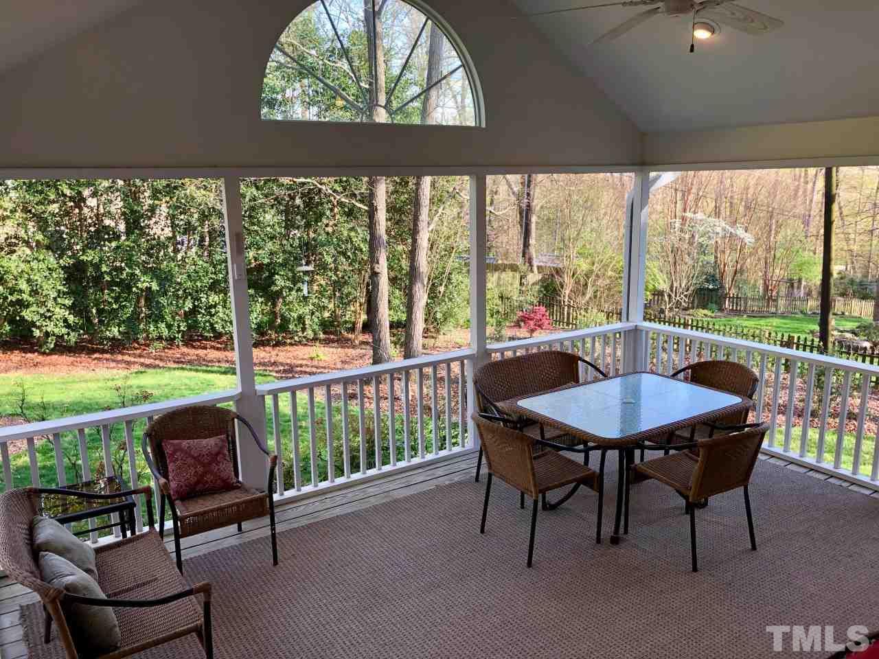 5412 Fairoaks Road Durham, NC 27712 - Photo 13 of 25 a view of a porch with furniture and a yard