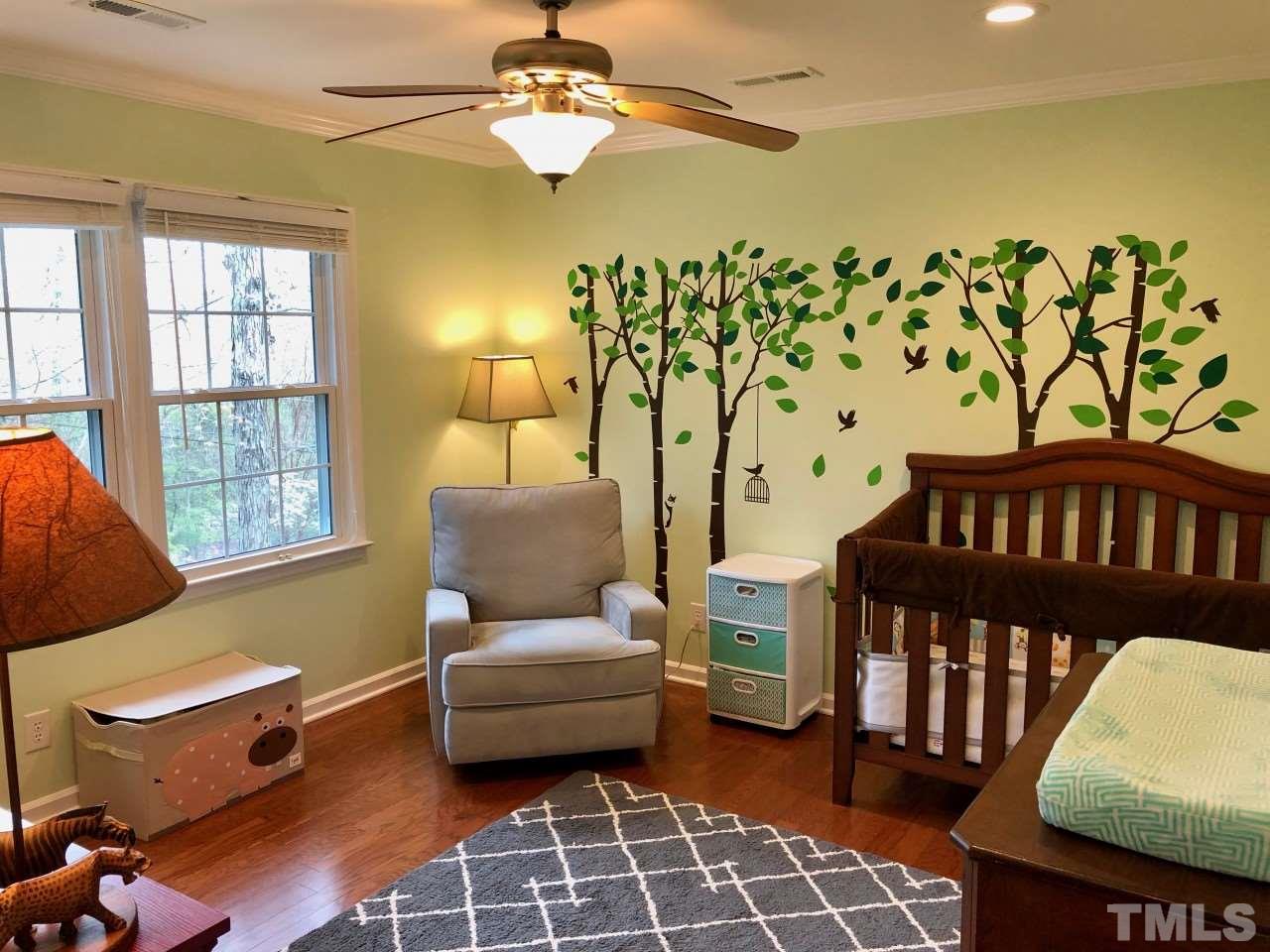 5412 Fairoaks Road Durham, NC 27712 - Photo 18 of 25 a living room with furniture and a window